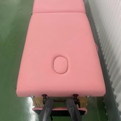 Pink portable massage table