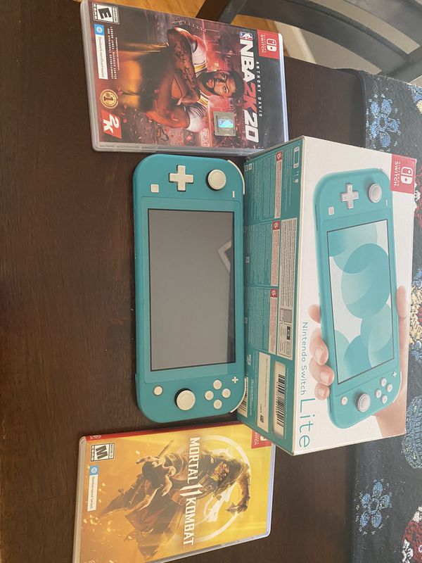 Nintendo switch light with two games and 256g chip for Sale in Albuquerque, NM - OfferUp