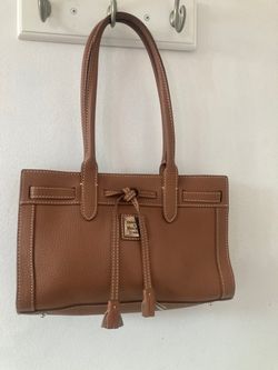 Dooney Bourke tan 11”X8” in great condition