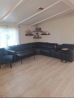 Leather sectional recliners