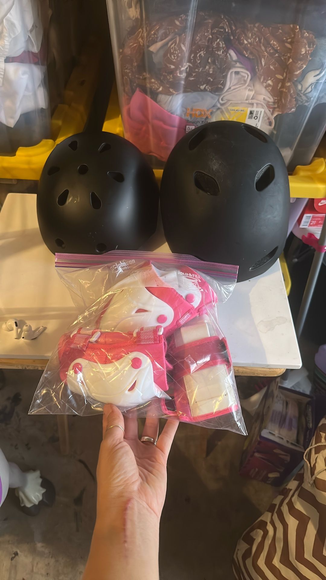 Black Helmets And Pink Protective Gear