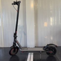 Double shock-absorbing electric scooter