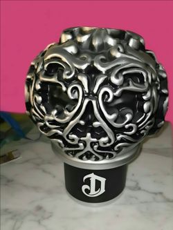 Decorative Skull Sculpture with Ornate Scrollwork