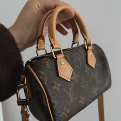 Luxury women's brown crossbody bag