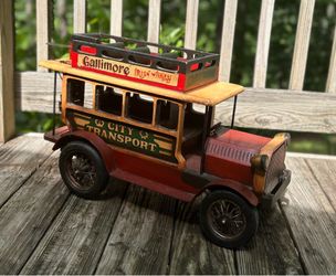 Large vintage wooden double-decker bus