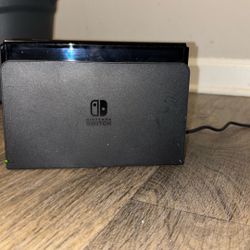 Nintendo Switch with Neon Blue and Neon Red Joy-Con