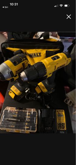 Dewalt 20 volt Drill and impact set still like new 2 batteries charger bag asking 150 need gone moving soon