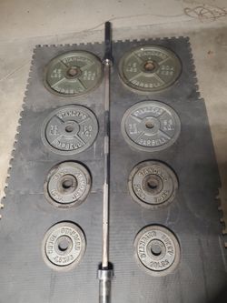 Olympic Weight Set Includes 7ft Solid 45lb  Bar 2x45lb 2x35lb 2x25lb and 2x10lbs Thats 275lbs All Together With bar