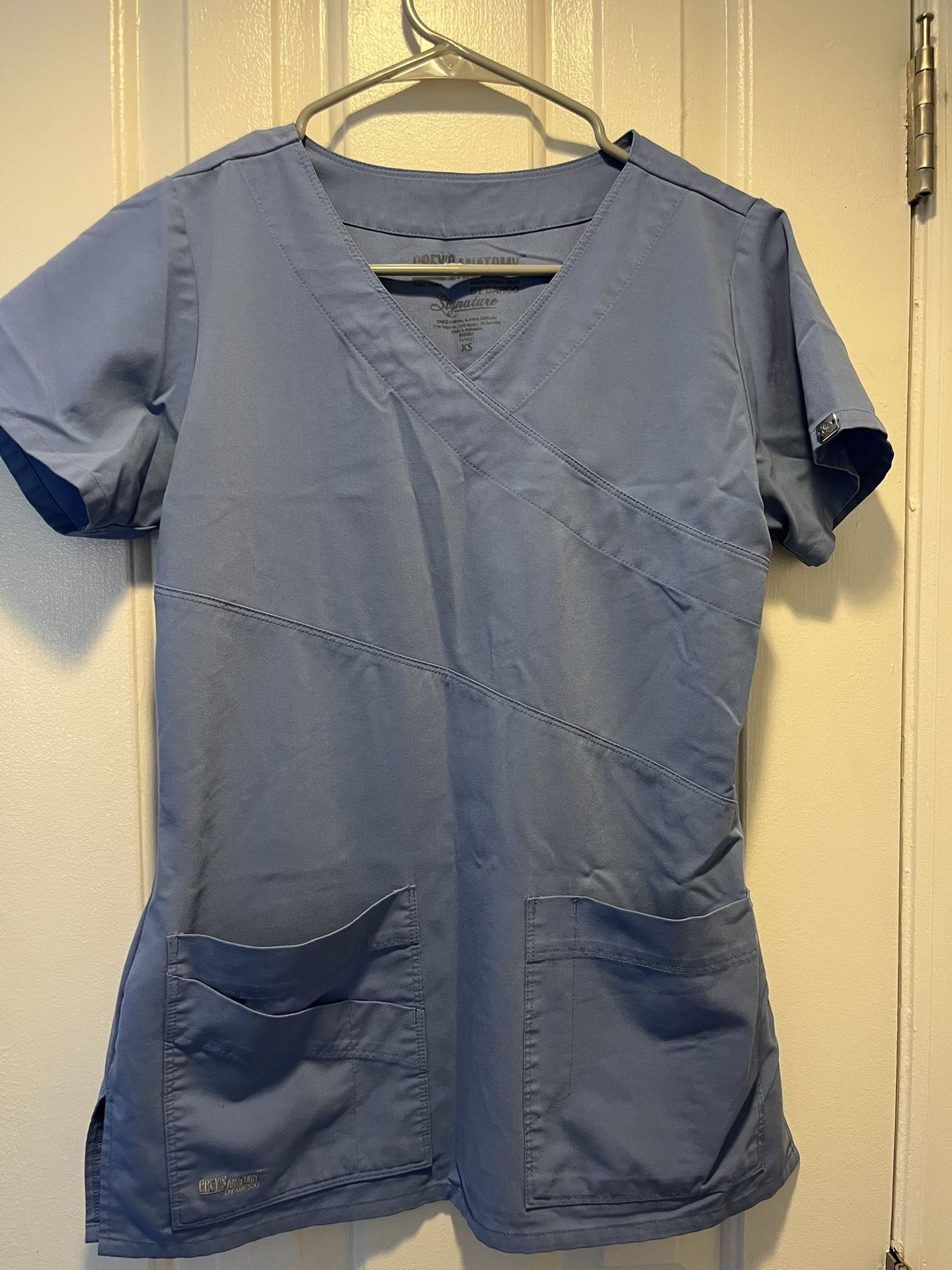 Various Ceil Blue Scrub Sets and UNC Rex Jackets