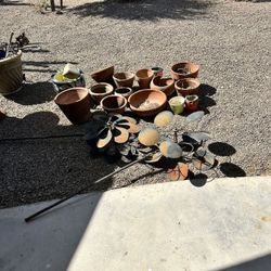 13 Clay Pots 2 Metal Windmills And Throwing  In Other Plant Pots 