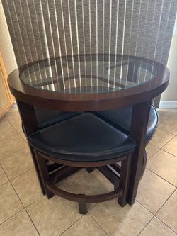Round Glass Top Dining Table With 4 Nesting Stools