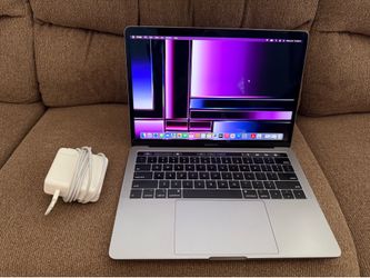 2018 MacBook Pro 13”, quad core i5, 8gb Ram. 256gb