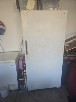 White Upright Freezer or Refrigerator