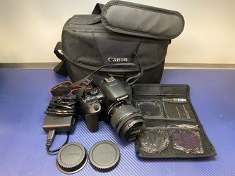 CANON EOS 850D WITH EF-S 18-55MM LENS, CHARGER, AND BAG