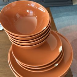 clay/brown/orange dinner set, plates and bowls