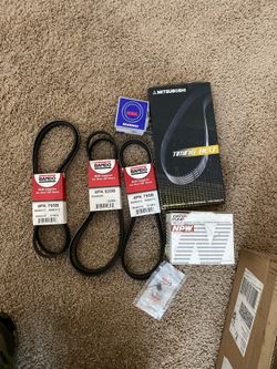 Timing Belt and Water Pump complete set. Oem parts.