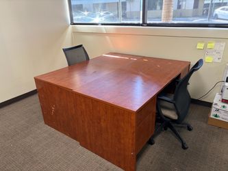 Two desks with drawers and two chairs