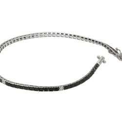 Ladies White Gold Tennis Bracelet With Diamonds And Black Diamonds
