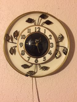 Vintage United metal goods co inc. electric clock.