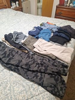 Bag Of boys clothing sizes 10/12 and size 12. Two items are new. All in excellent condition. Total Price 12 dollars
