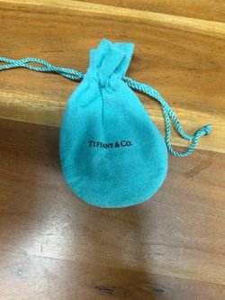 Tiffany & Co. Sterling Silver Concave Cross Pendant on a 24” chain