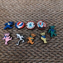 9 PC. GRATEFUL DEAD CROC SHOE CHARMS.  NEW.  PICKUP ONLY.