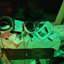 2 Controllers, Both VR Headsets. Psvr1 Gun And Wands And Camera. Psvr2 With Charging Stand As Well.