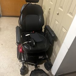Pride Mobility Wheelchair. Used twice. No longer needed. Excellent condition.