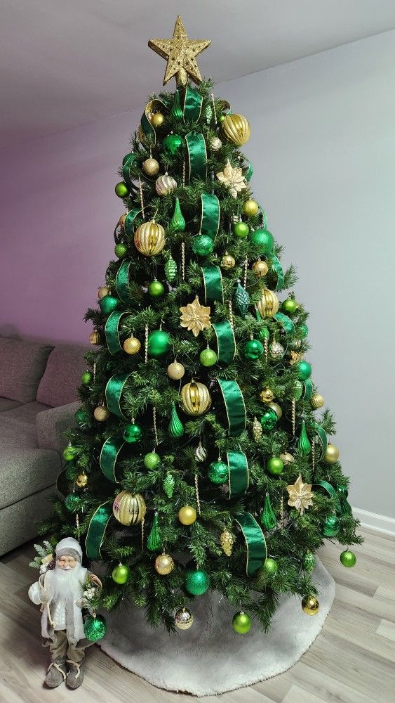 Non-Lit Donner Fir Artificial Christmas Tree, 7.5 ft. Assembles Each Branch At The Time. 1310 Tips. Great Condition. Decorations NOT Included