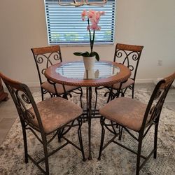 Breakfast Nook Glass Table And Four Chairs $75