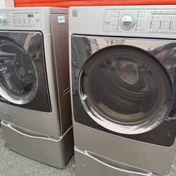 Kenmore Elite washer and Gas dryer on pedestals