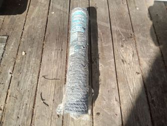 New Roll of Chicken Wire, 24" Tall, 50' Long, New Condition. $10.00.