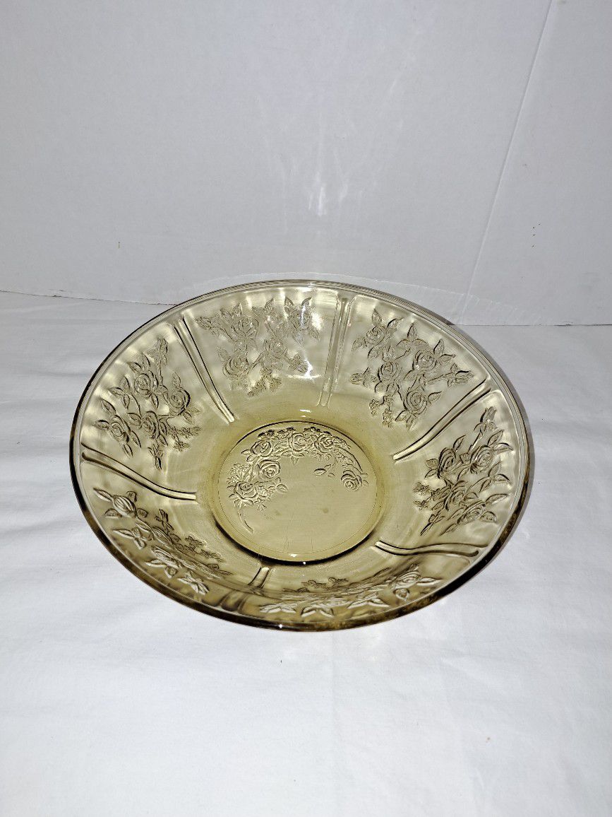 Beautiful vintage yellow glass serving bowl with rose pattern.