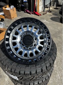 18x9 KMC 8 LUG WHEELS