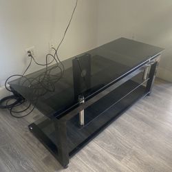 BEAUTIFUL GLASS AND HEAVY STEEL TV STAND