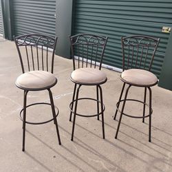 3 Swivel Barstools. 30" High from seat to floor