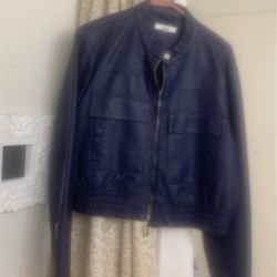 Woman.  Jacket. Is. Blue. Leather. Size. Xl. 