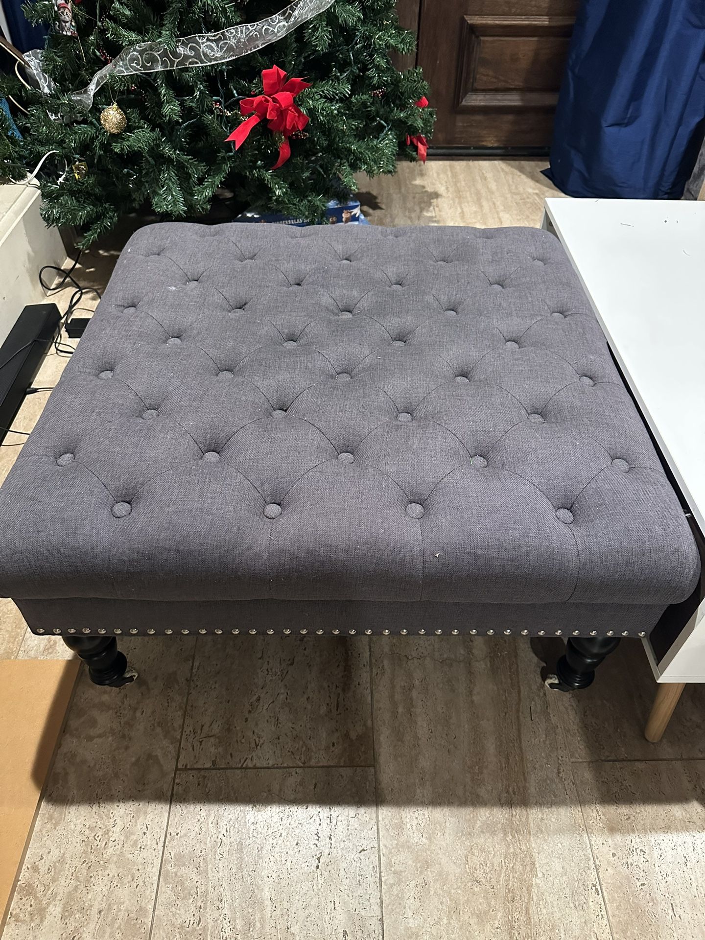 Grey Ottoman. Good Condition