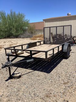 Trailer with ramp 12’4 x 6’6”