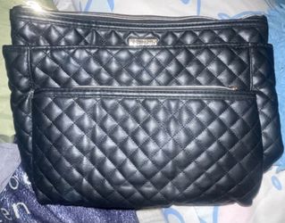 Joan & David Travel Bags
