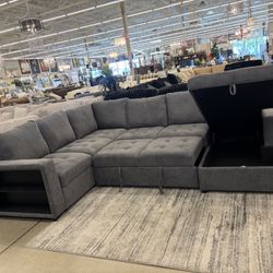 Sectional W Pull Out Bed And Storage Chaise