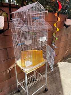 Tall birdcage on wheels