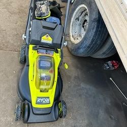 RYOBI  ONE+ HP 18V Brushless 16 in. Cordless Battery Walk Behind Push Lawn Mower with (2) 4.0 Ah Batteries and (1) Charger  
