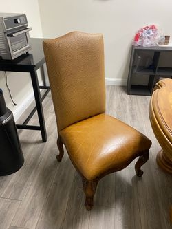 Ostrich Leather Dining Chairs (4) and Oak dining table