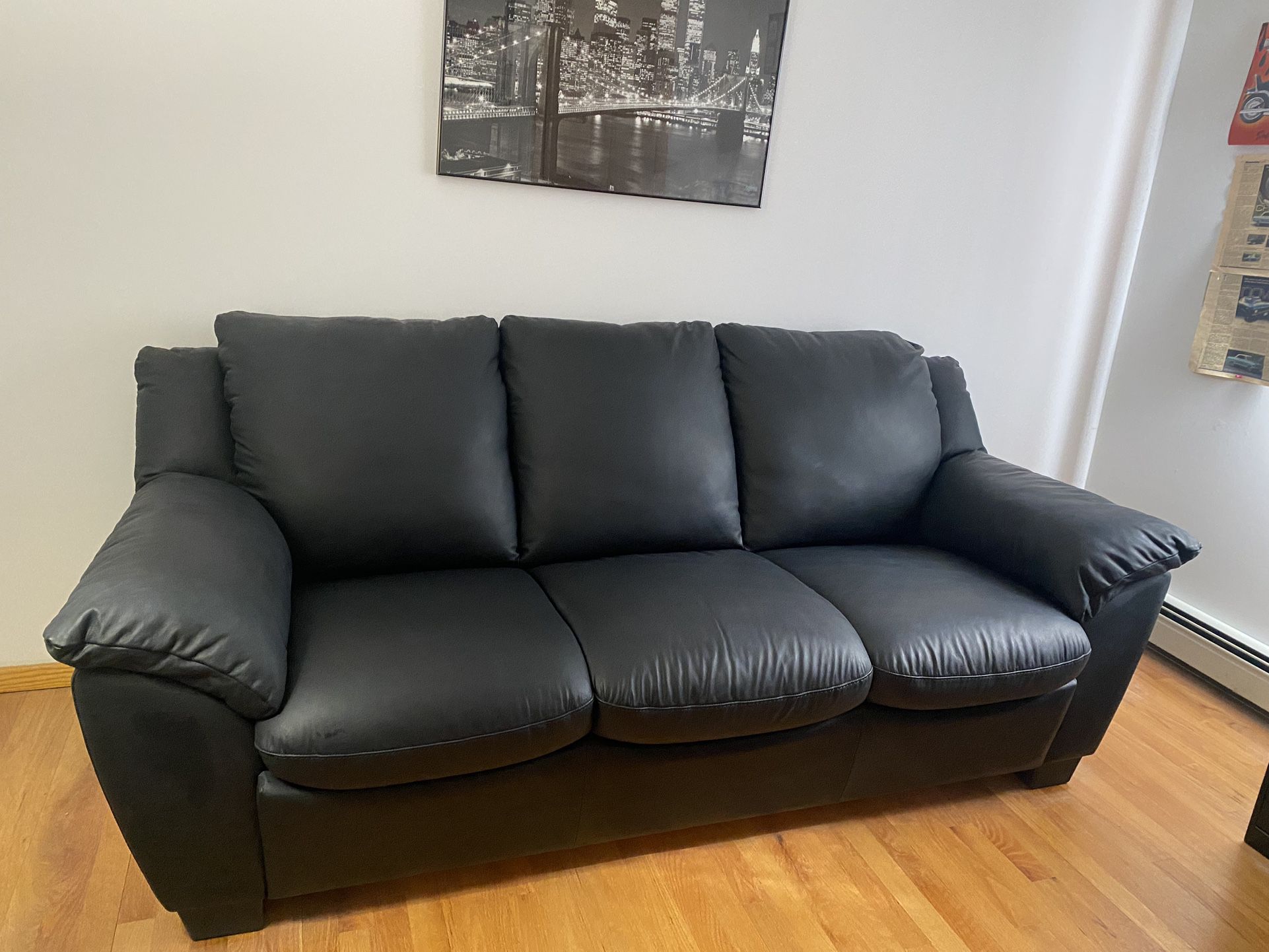 **LIKE NEW - LEATHER ITALSOFA BY NATUZZI - WITH PULL OUT SLEEPER