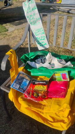 1 yellow,Top & Bottom Heavy-Duty Rain Gear, 1Green Bottom Rain Gear,Heavy -Duty.1-$tuff Bag,I small blue pancho Rain gear & 7Packs o ft hand warmer
