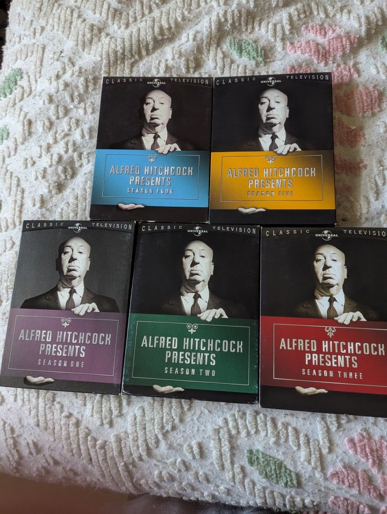 This Was A Set Of Five Sets Of DVDs Of Alfred Hitchcock Movies On DVDs