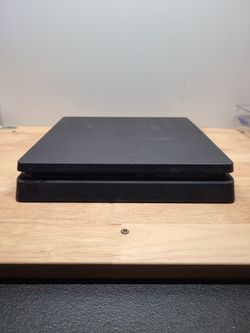 Broken black ps4 slim