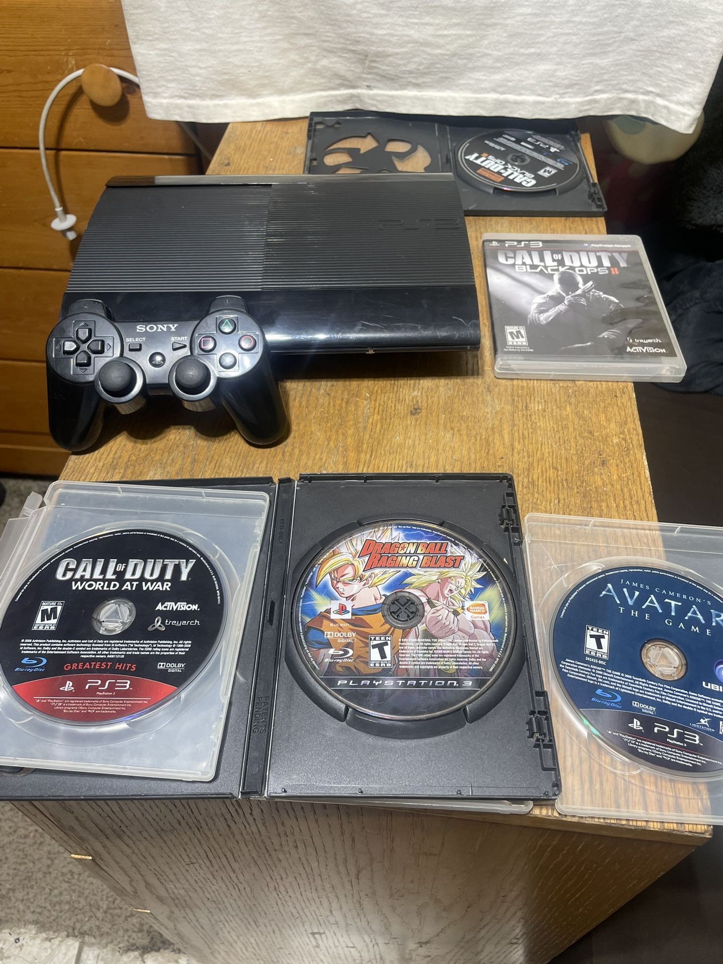 Playstation 3 Super Slim 250GB Lot Bundle Controller, Cables, & 5 Games PS3