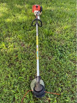 Lawn mower/weed eater Stihl straight shaft excellent condition work perfect
